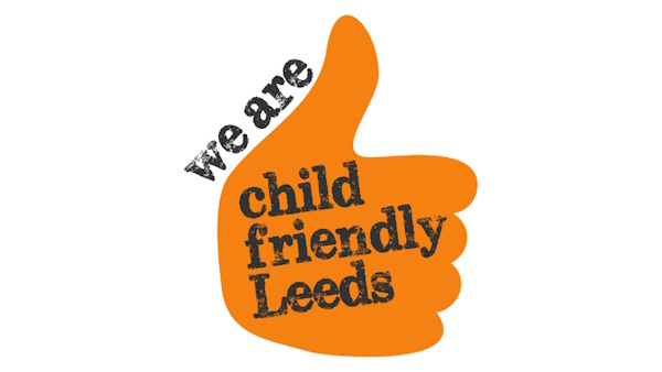 Child Friendly Leeds logo - orange hand with thumbs up. Text reads - we are child friendly leeds